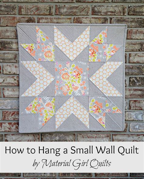 how to hang a small fabric quilt on metal wall|inexpensive mini wire quilt holder.